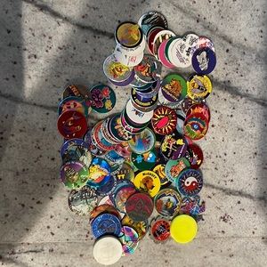 Lot of mixed Pogs and slammers